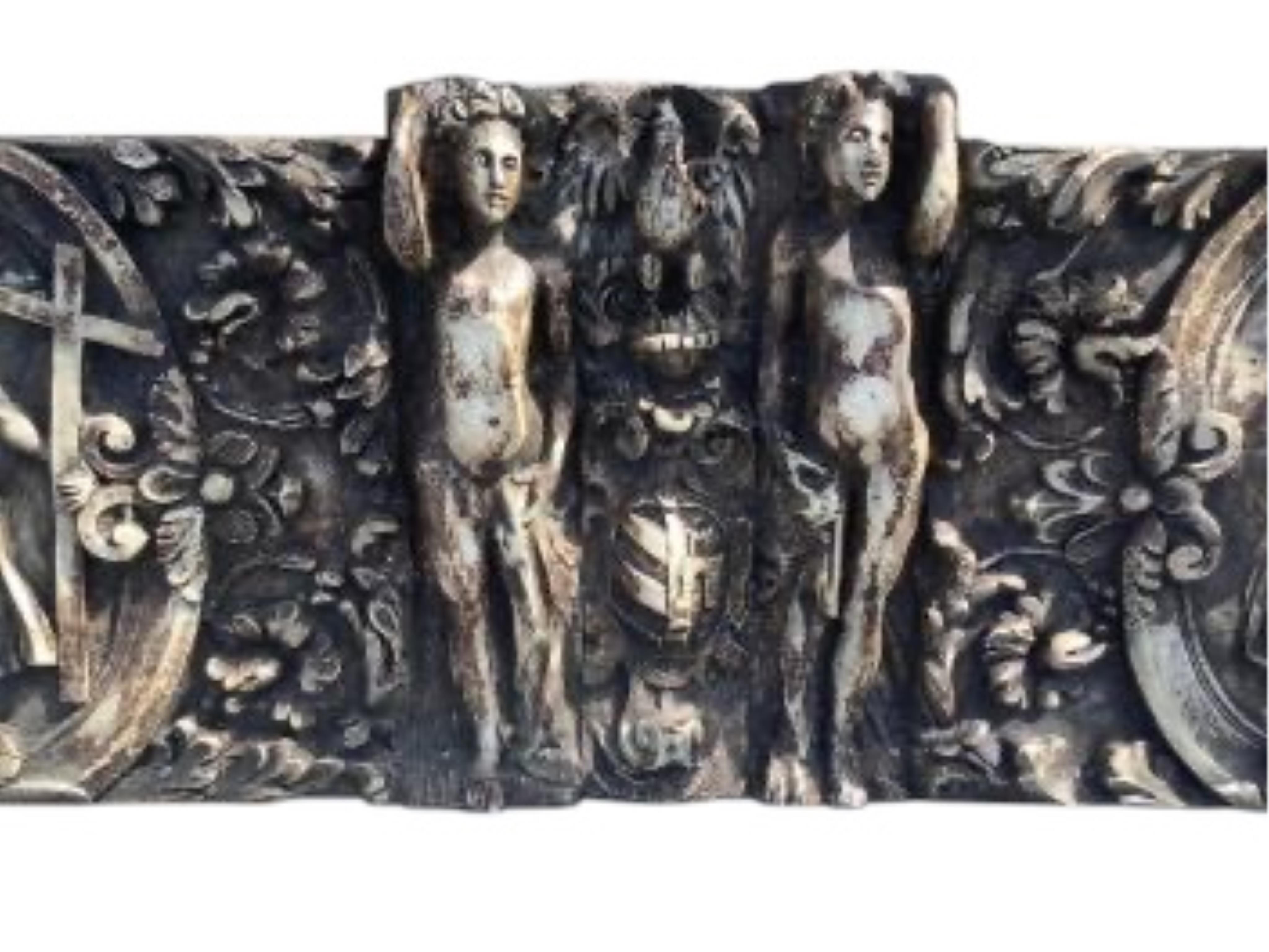 A cast plaster classical wall plaque, width 122cm, height 37cm